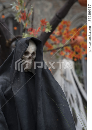 human skull in black hooded concept on copy space 83166617