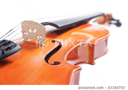 Part of old violin on white background. Musical instrument of vintage style. Part of old violin on white background. Musical instrument of vintage style. 83168783