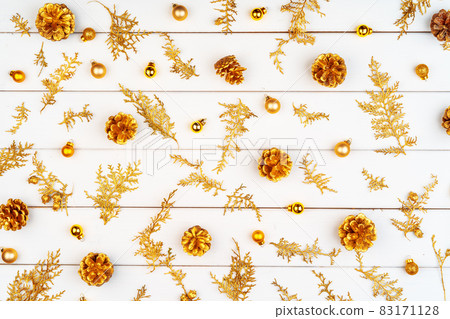 Christmas pattern of holiday decorations on white wooden background Christmas pattern of holiday decorations on white wooden background 83171128