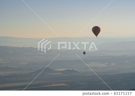 hot air balloons rising over the Cappadocia valley 83171157