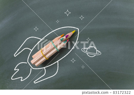 Drawing of a rocket with pencils on blackboard Drawing of a rocket with pencils on blackboard 83172322