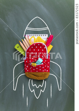 Back to school concept with miniature backpack Back to school concept with miniature backpack 83172323