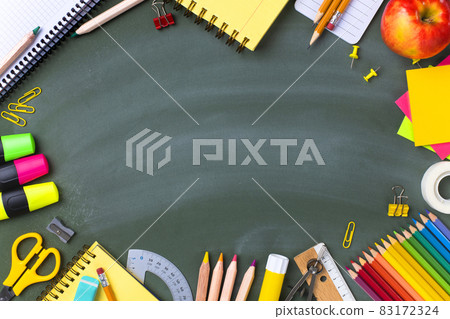School supplies on blackboard. Back to school concept.. School supplies on blackboard. Back to school concept.. 83172324