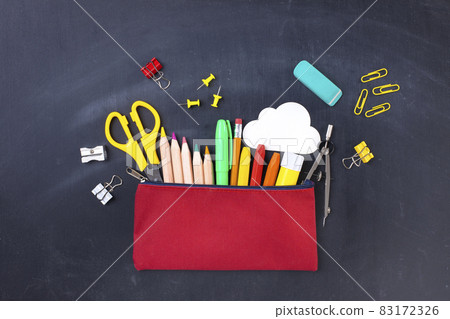 Back to school concept. Pencil case on blackboard Back to school concept. Pencil case on blackboard 83172326