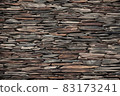 Decorative concrete tiles. Grey concrete wall. Grunge concrete wall. 83173241