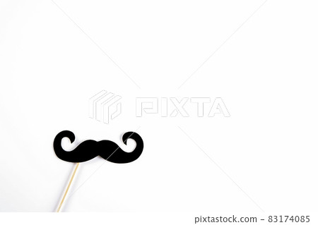 Paper party attributes in form of mustache on wooden stick. Carnival accessory concept. 83174085