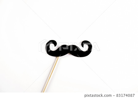 Paper party attributes in form of mustache on wooden stick. Carnival accessory concept. 83174087