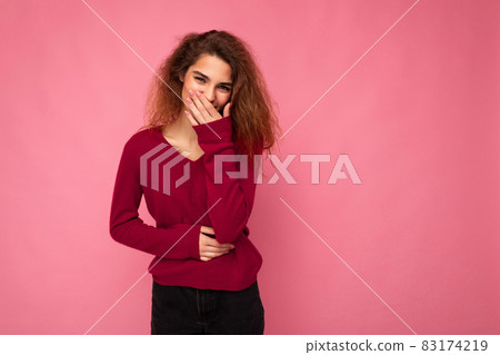 Photo of young happy positive pretty nice brunette wavy woman with sincere emotions wearing casual 83174219