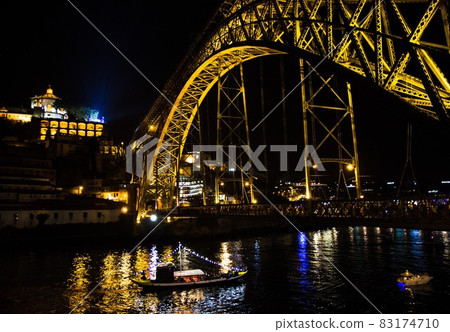 Portugal, night Porto, lights of night city, night panoramic view of The Eiffel Bridge, Ponte Dom Luis 83174710