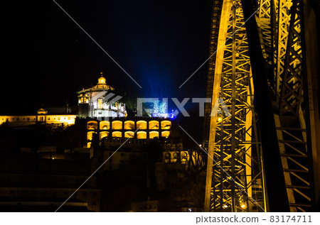 Portugal, night Porto, lights of night city, night panoramic view of The Eiffel Bridge, Ponte Dom Luis 83174711