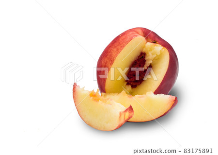 Ripe red nectarine and slices isolated on a white background. Place for text 83175891