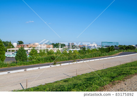 Along the bank of Arakawa, near the Western Environmental Center, the scenery in the direction of Sashiogi, the scenery of midsummer Along the bank of Arakawa, near the Western Environmental Center, the scenery in the direction of Sashiogi, the scenery of midsummer 83175892