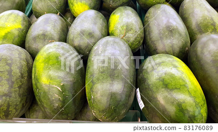Lots of watermelons are placed together for sale. Lots of watermelons are placed together for sale. 83176089