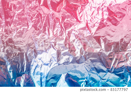 Colourful foil background with shiny crumpled surface. 83177797