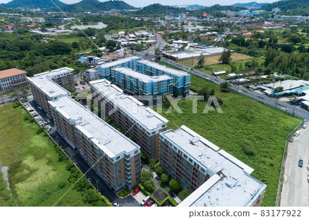 Development real estate aerial drone view of the village in summer season and Roofs of the houses Bird's-eye view of roads and mountain background 83177922