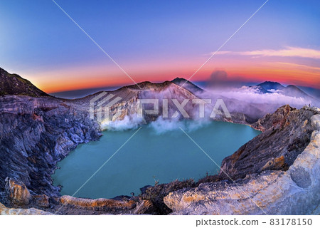 Beautiful view of Kawah Ijen lake and volcano early morning at East Java, Indonesia. Beautiful view of Kawah Ijen lake and volcano early morning at East Java, Indonesia. 83178150