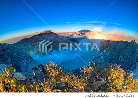 Beautiful view of Kawah Ijen lake and volcano early morning at East Java, Indonesia. Beautiful view of Kawah Ijen lake and volcano early morning at East Java, Indonesia. 83178152