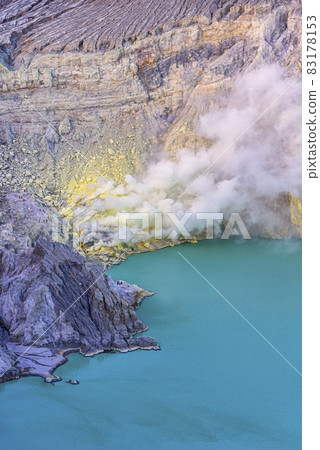 Beautiful view of Kawah Ijen lake and volcano early morning at East Java, Indonesia. Beautiful view of Kawah Ijen lake and volcano early morning at East Java, Indonesia. 83178153