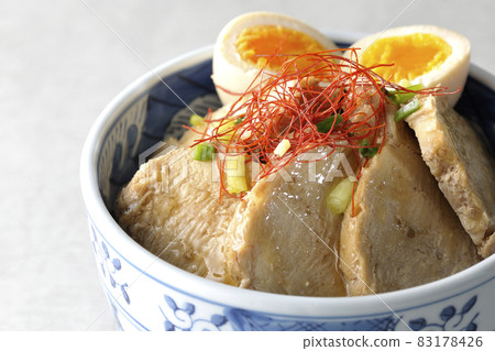Chicken char siu bowl with boiled egg, all-purpose green onion and thread-cut chili pepper 83178426