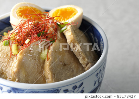 Chicken char siu bowl with boiled egg, all-purpose green onion and thread-cut chili pepper 83178427