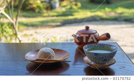 Manju and Japanese tea | Tea confectionery image on the porch Manju and Japanese tea | Tea confectionery image on the porch 83178782