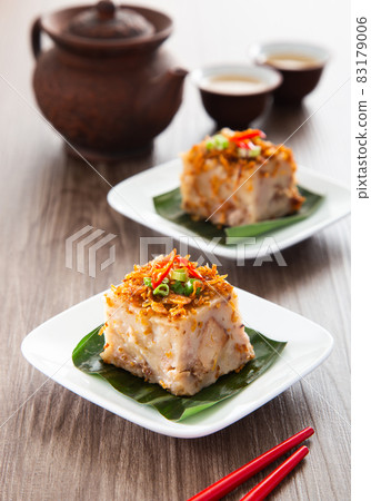 Steamed Yam Cake with Ground Deep-Fried Dried Shrimps Toppings. Chinese Cuisine Steamed Yam Cake with Ground Deep-Fried Dried Shrimps Toppings. Chinese Cuisine 83179006