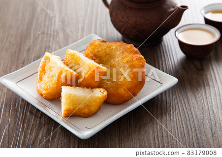 Ham chim peng. (deep-fried chinese doughnut) 83179008