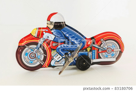 Vintage tin toy motorcycle , tin toy motorcycle, Isolated white Vintage tin toy motorcycle , tin toy motorcycle, Isolated white 83180706