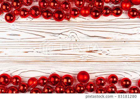 Beautiful Christmas background with red shiny baubles, copy space 83181280