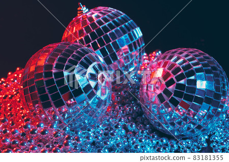 Mirror balls Illuminating in the dark close up Mirror balls Illuminating in the dark close up 83181355