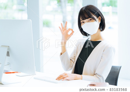Woman working with mask Woman working with mask 83183568