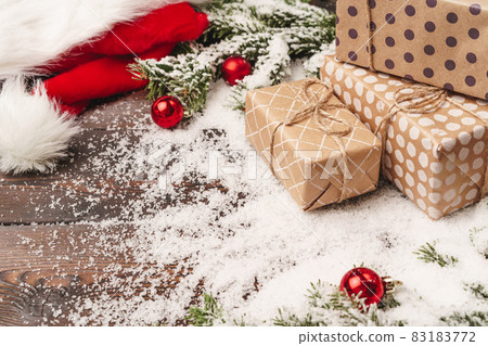Wrapped gift for winter holidays background with copy space Wrapped gift for winter holidays background with copy space 83183772