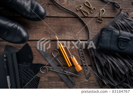 Leather crafting. Tools flat lay still life Leather crafting. Tools flat lay still life 83184767