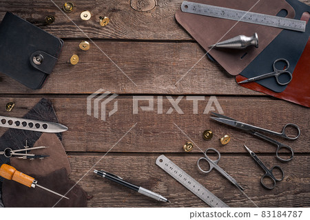Leather crafting. Tools flat lay still life Leather crafting. Tools flat lay still life 83184787