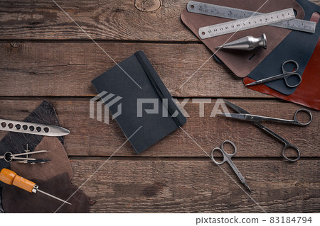 Leather crafting. Tools flat lay still life 83184794