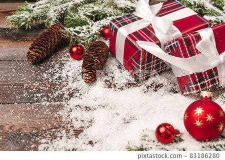 Wrapped gift for winter holidays background with copy space Wrapped gift for winter holidays background with copy space 83186280