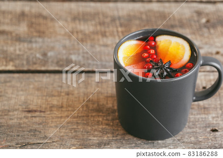 Mulled wine hot drink with fruit and spices 83186288