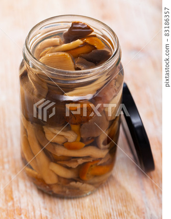 Close-up of delicious marinated mushrooms assorted 83186357