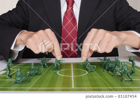 Image of proxy war in which both soldiers fight on the pitch as hand pieces Image of proxy war in which both soldiers fight on the pitch as hand pieces 83187454
