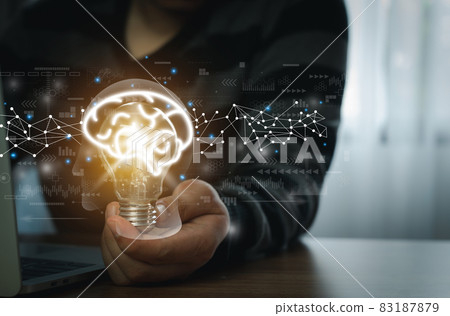 Hand man holding of light bulb with brain icon. Using laptop online technology working. Creative ideas. New idea, Creativity innovation and solution concepts. Human Inspiration . community connection. Hand man holding of light bulb with brain icon. Using laptop online technology working. Creative ideas. New idea, Creativity innovation and solution concepts. Human Inspiration . community connection. 83187879