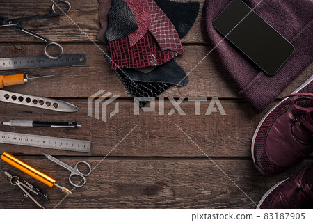 Leather crafting. Tools flat lay still life Leather crafting. Tools flat lay still life 83187905