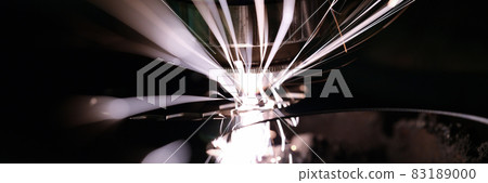 Hot sparks at grinding steel material closeup Hot sparks at grinding steel material closeup 83189000