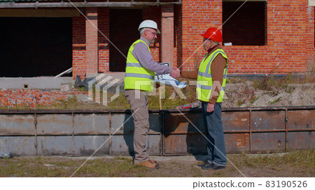Real-estate agent selling house to senior old grandfather man, receive money dollar cash banknotes Real-estate agent selling house to senior old grandfather man, receive money dollar cash banknotes 83190526