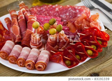Spanish sausage sliced - chorizo, fuet, jamon, salami, bacon Spanish sausage sliced - chorizo, fuet, jamon, salami, bacon 83191339