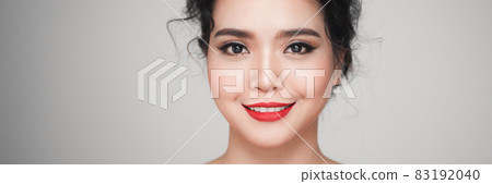 Fashion portrait of asian woman with elegant hairstyle. Perfect makeup. Fashion portrait of asian woman with elegant hairstyle. Perfect makeup. 83192040