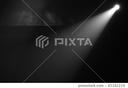 Bright spotlight in a dark cave Bright spotlight in a dark cave 83192228