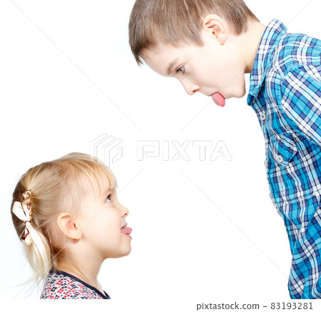 Children sticking out tongues Children sticking out tongues 83193281