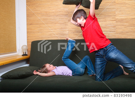 Siblings having pillow fight Siblings having pillow fight 83193498