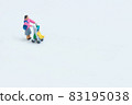 A woman strolling a stroller 83195038