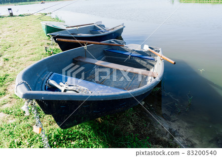Old boats on a lake, beauty world. Retro style. 83200540